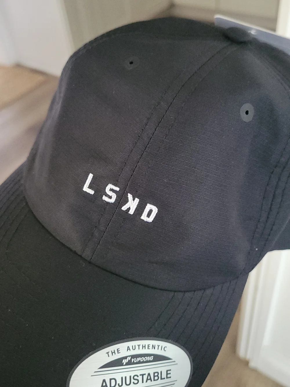 Black Embroidered Train Cap